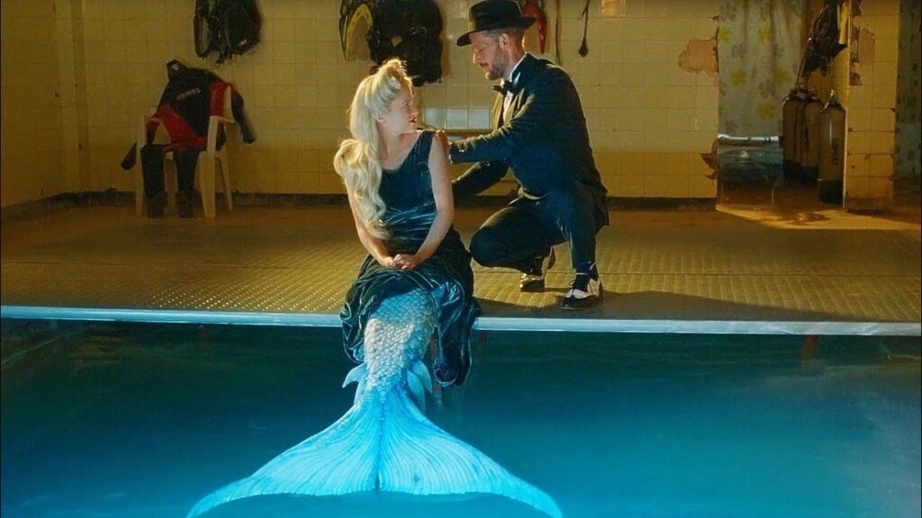 Naked as the Ocean Born Her, She Still Holds His Heart With Every Tide