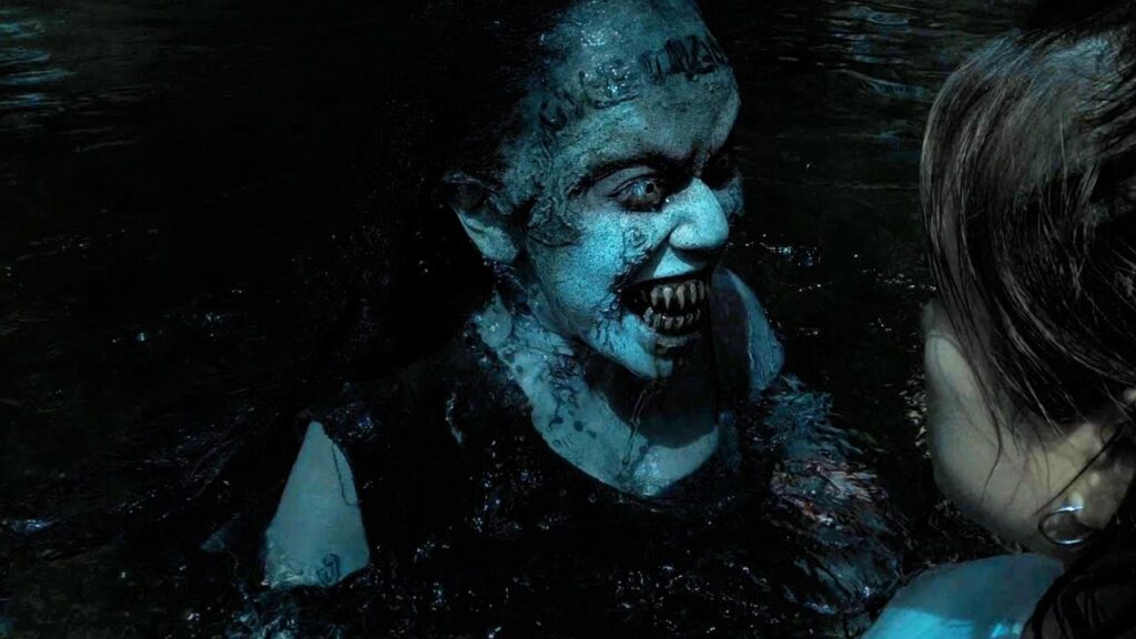Creepy blue skinned water demon emerges from the lake to drag a young girl into the dark abyss