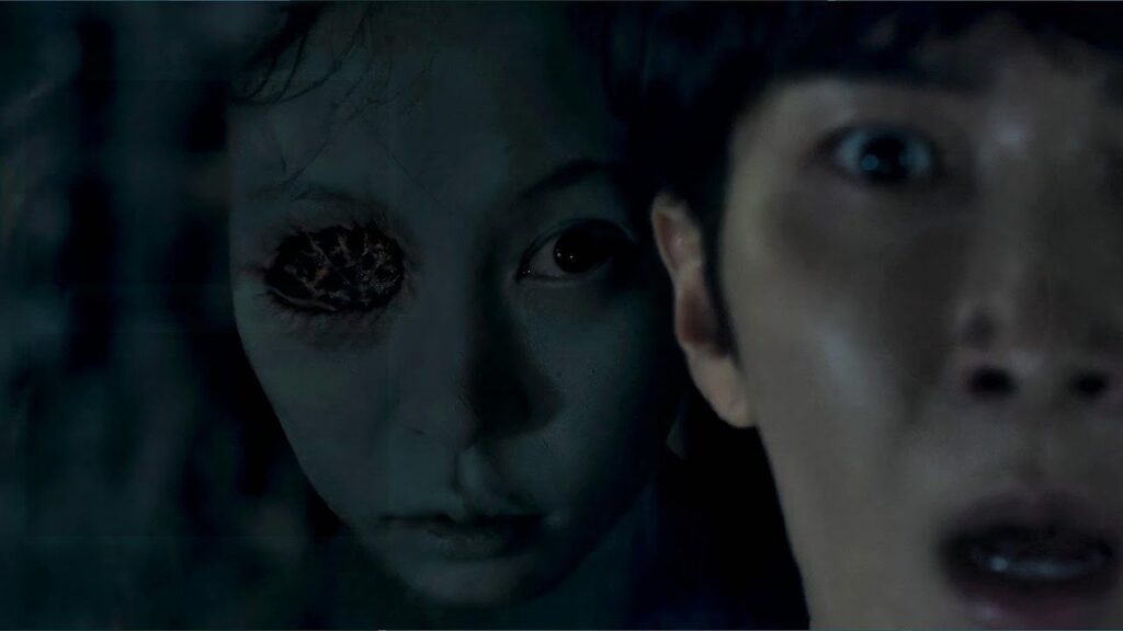 He Sees the Suffocated Girl in the Reflection, Her Mutilated Eye Staring Back at Him.
