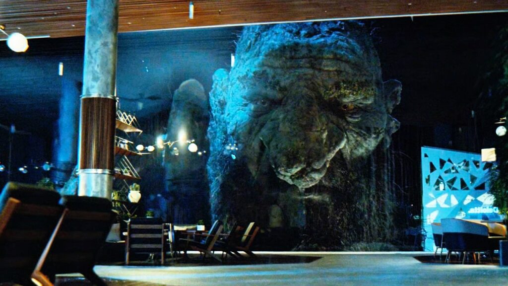 Employees Relaxing In The Lounge Did Not Realize A GIANT Was Watching Them Outside